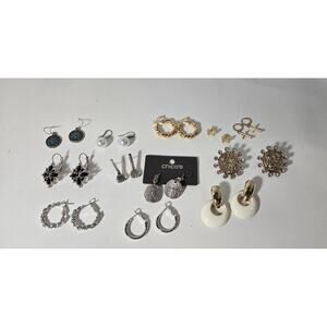 Twelve pair of silvertone and goldtone peirce earrings